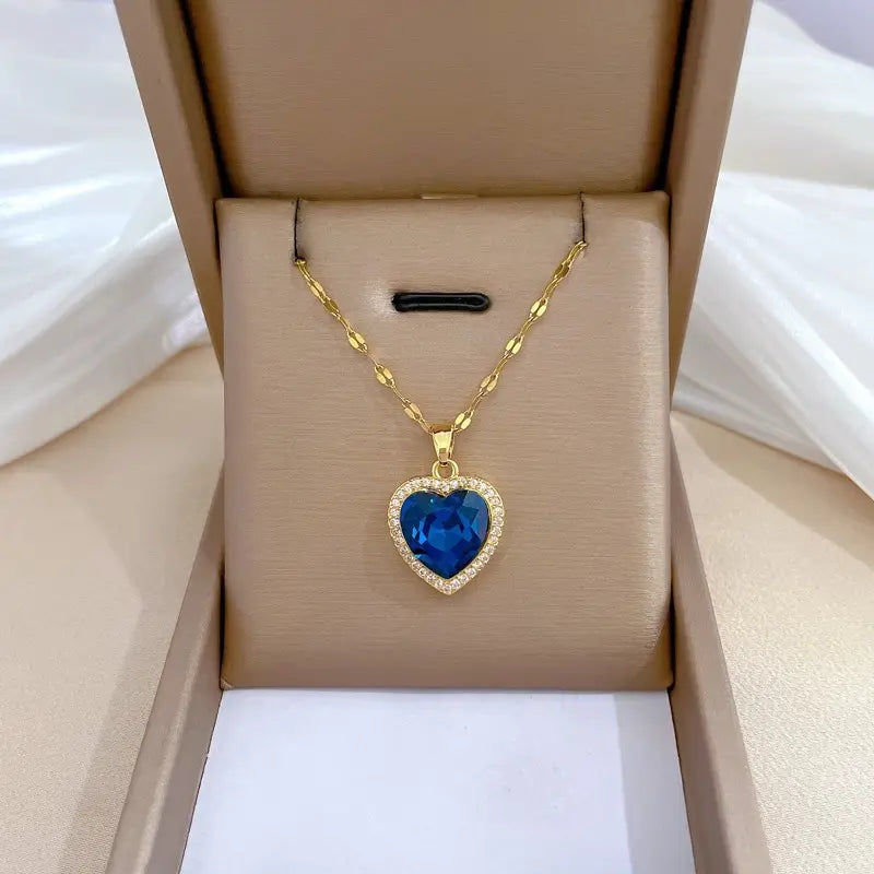 Blue Heart Stone Pendant Necklace in Gold Tone