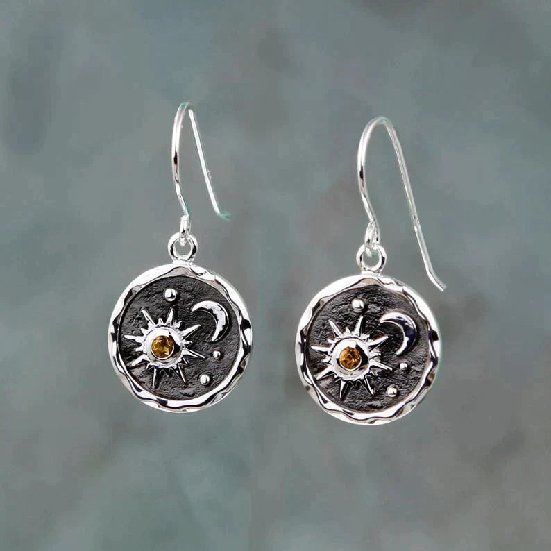 Boho-oorbellen met zon en maan