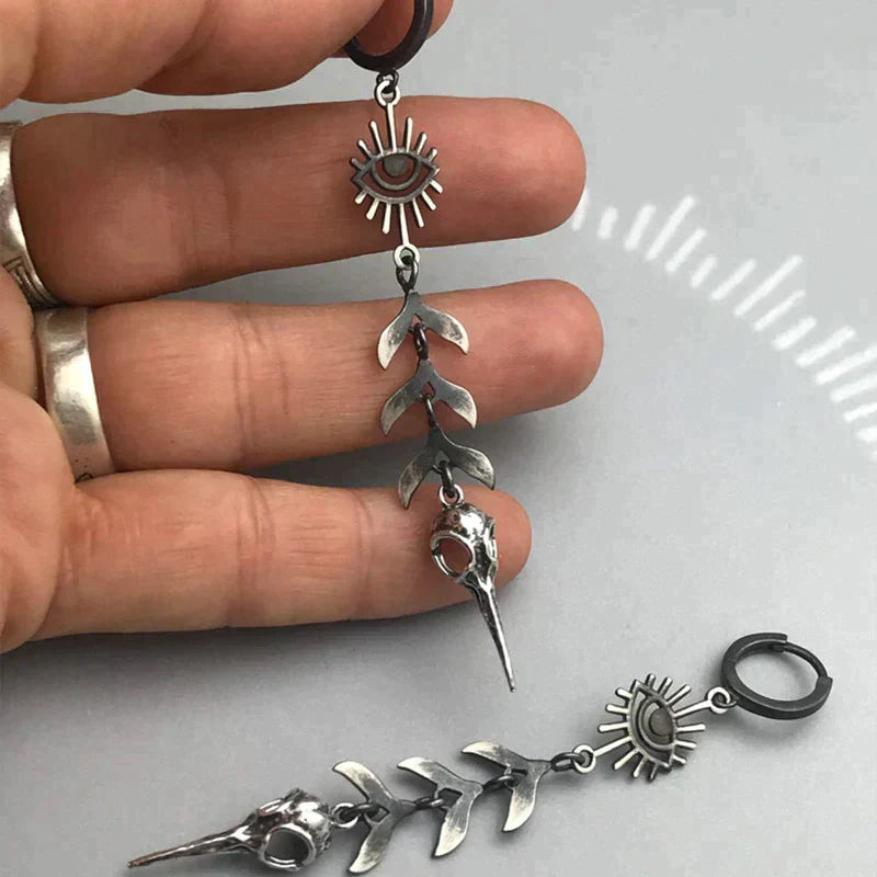 Boho oorbellen met maskerhanger in zilverkleur