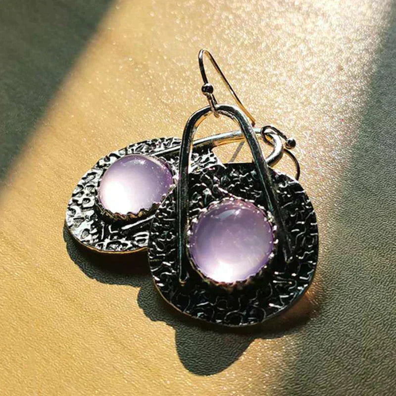 Boho oorbellen met paarse steen van sterling zilver