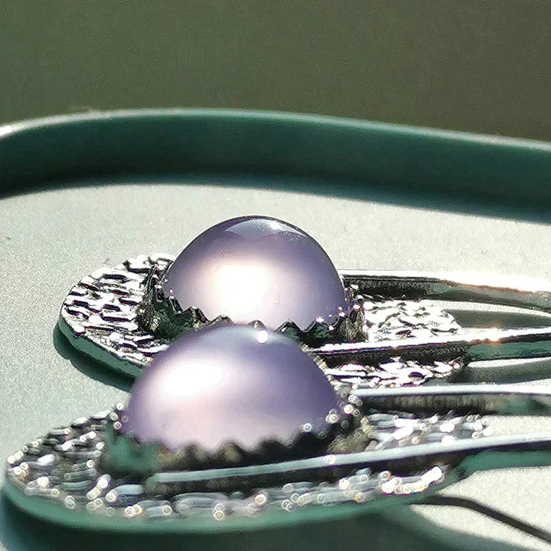 Boho oorbellen met paarse steen van sterling zilver