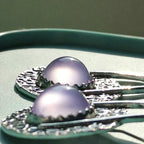 Boho oorbellen met paarse steen van sterling zilver