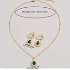 Set van ketting met kristallen druppelhanger en oorringen