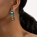 Zilverkleurige turquoise oorringen in southwesternstijl