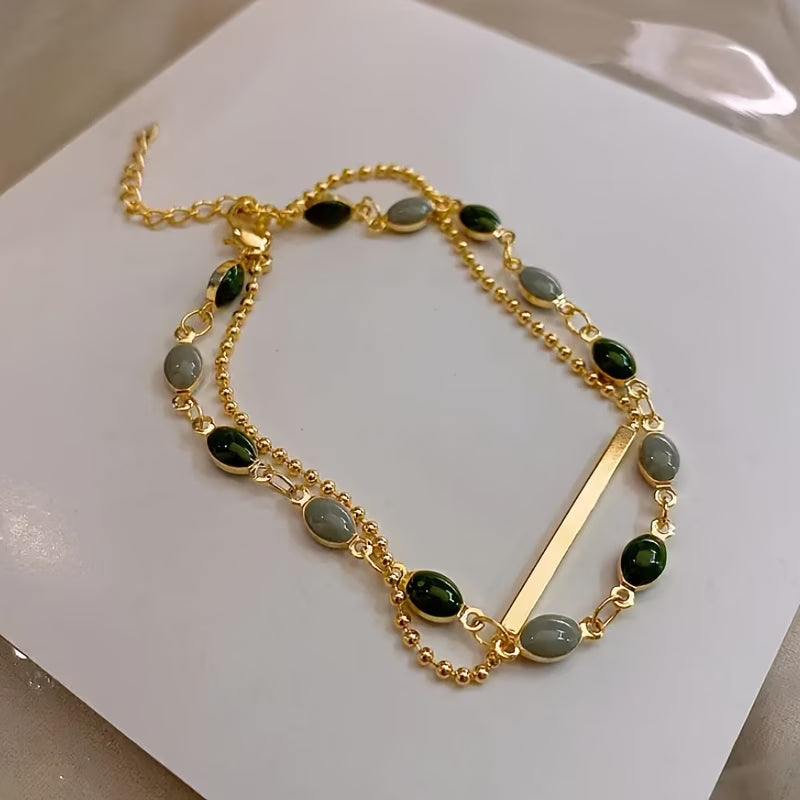 Gold-Tone Chain Bracelet with Green Square Stones