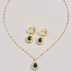 Set van ketting met kristallen druppelhanger en oorringen