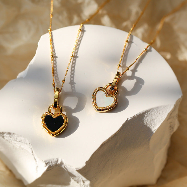 Black and White Heart Pendant Necklace in Gold Tone