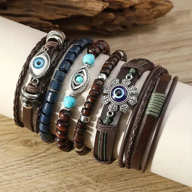 Meerstrengse armbandenstapel met oogkralen