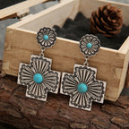 Retro gesneden bloemenoorbellen met turquoise kruis