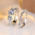 Zilverkleurige ringenset met kristal, solitair en eternitybanden