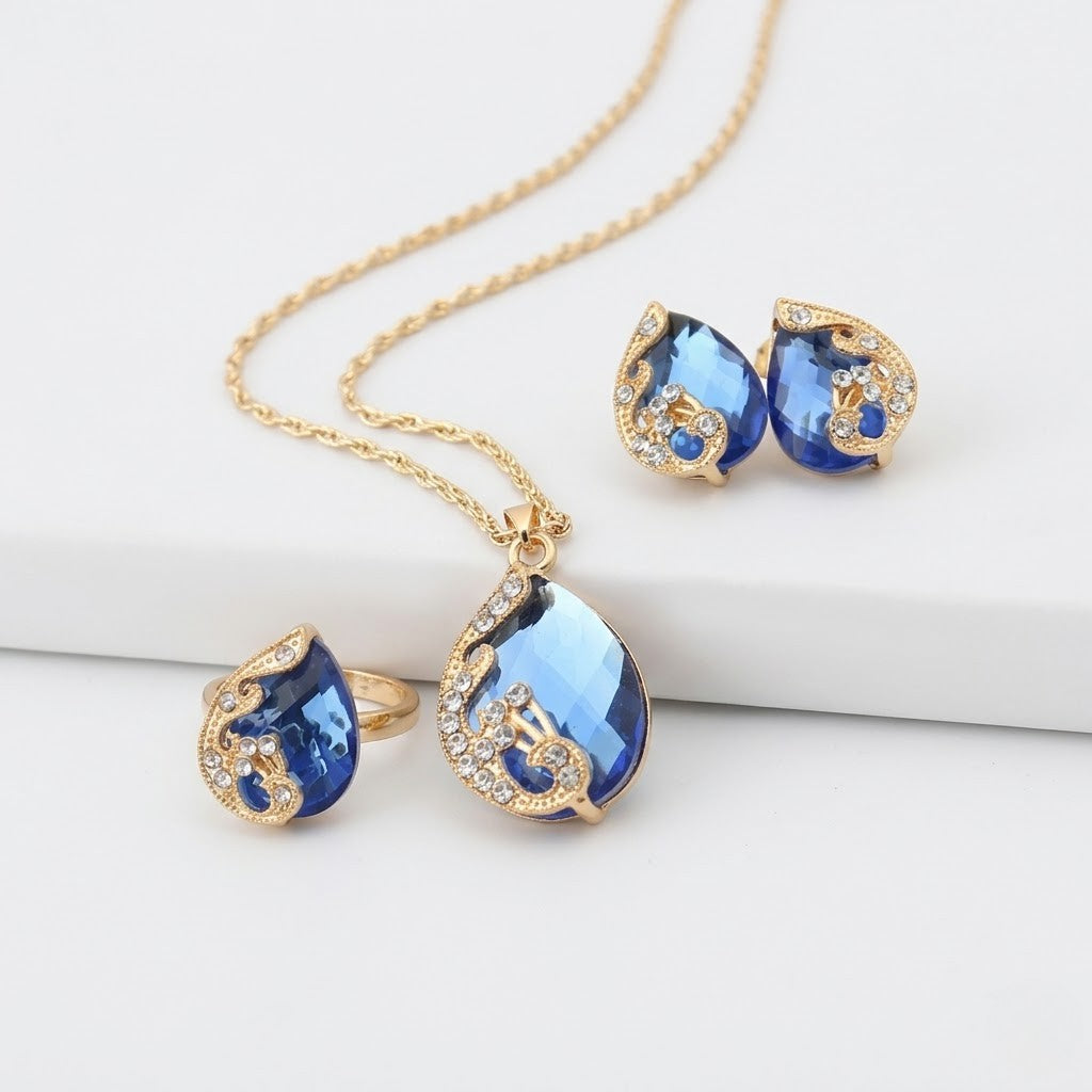 Blue Crystal Necklace and Earring Set in Gold Tone