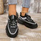 Ademende mesh sneakers met gedempte zool en vetersluiting