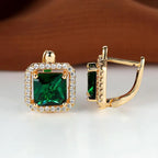 Halo-oorknopjes met groene vierkante zirkonia in goudkleur