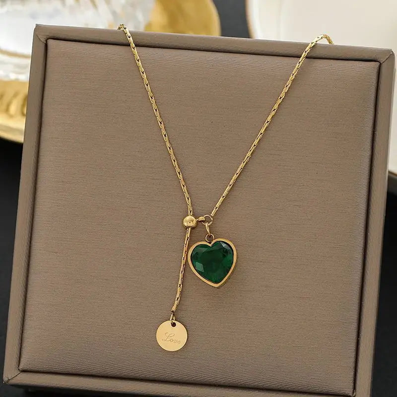 Gold-Tone Necklace with Green Heart and Disc Charms