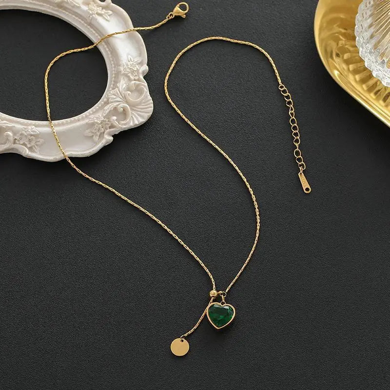 Gold-Tone Necklace with Green Heart and Disc Charms