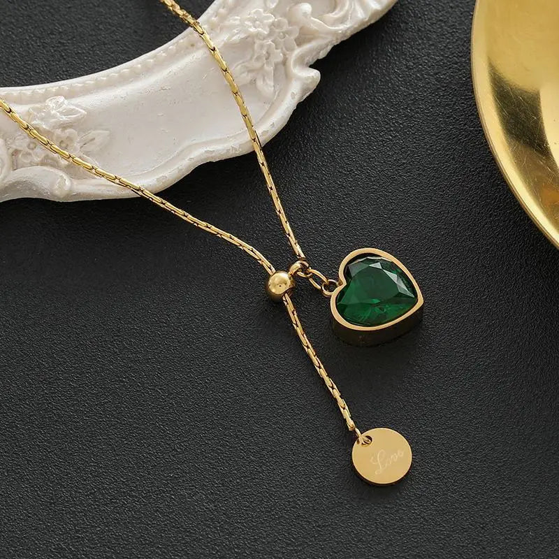 Gold-Tone Necklace with Green Heart and Disc Charms