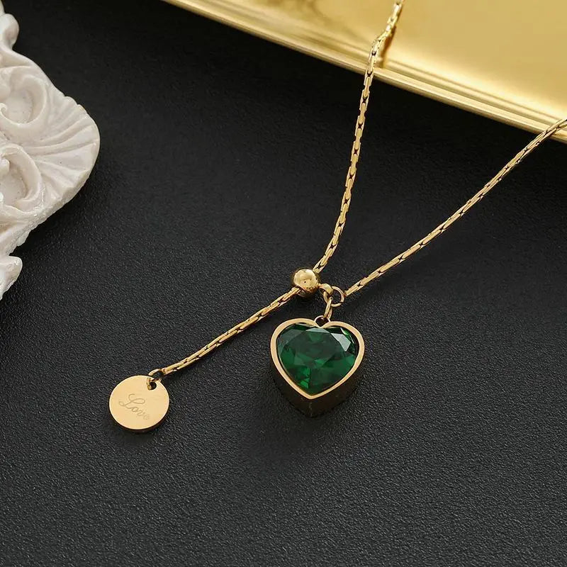 Gold-Tone Necklace with Green Heart and Disc Charms