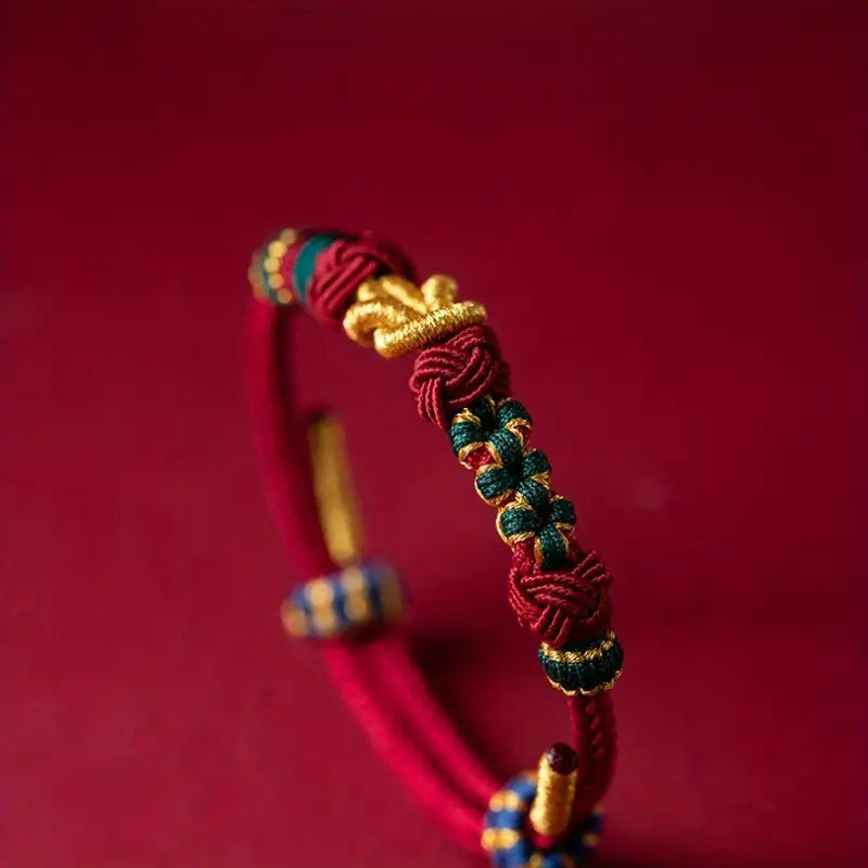 Handwoven Knot Bracelet in Red, Green and Blue Thread