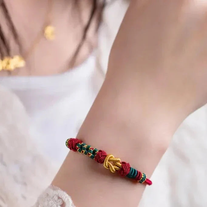 Handwoven Knot Bracelet in Red, Green and Blue Thread