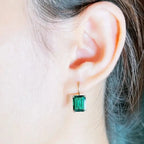 Green Emerald-Cut Stone Drop Earrings in Gold Tone