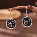 Runde vintageøreringe med sol, måne og stjerner i rhinsten
