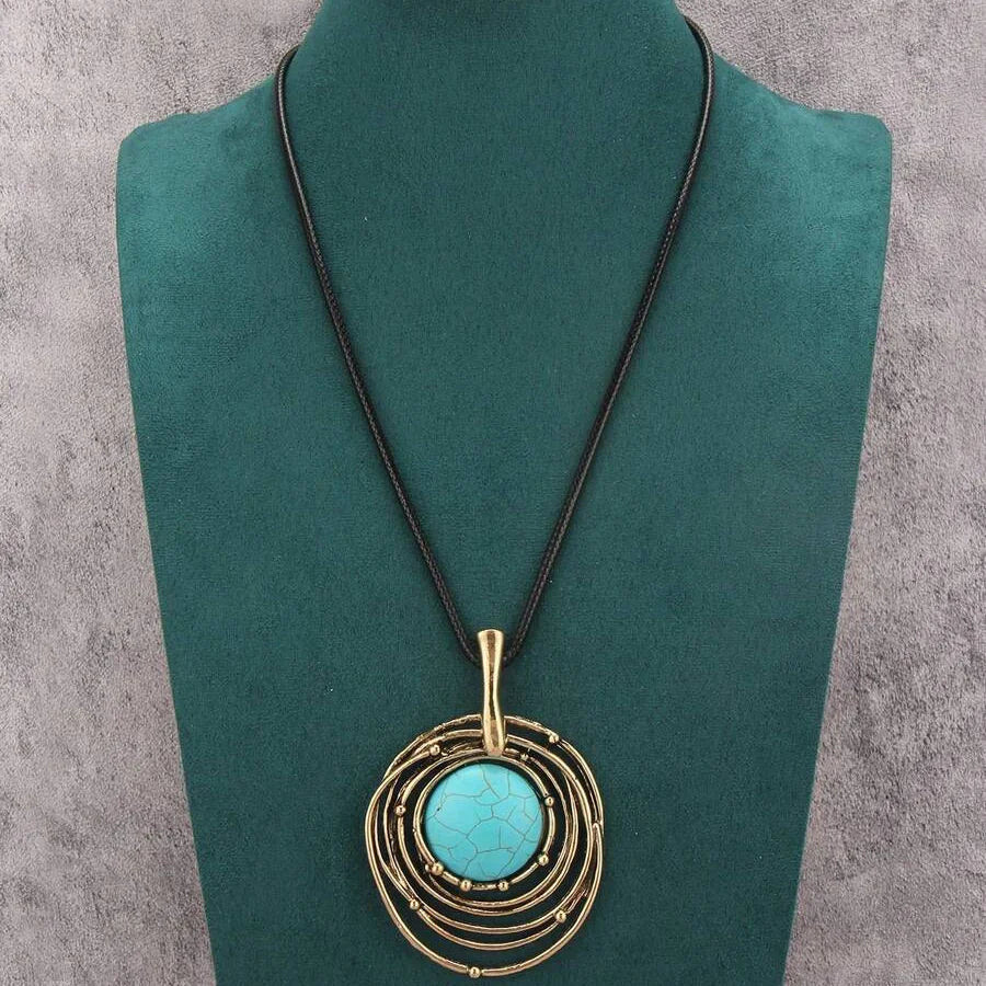 Lange ketting van zwart waskoord met turquoise steen
