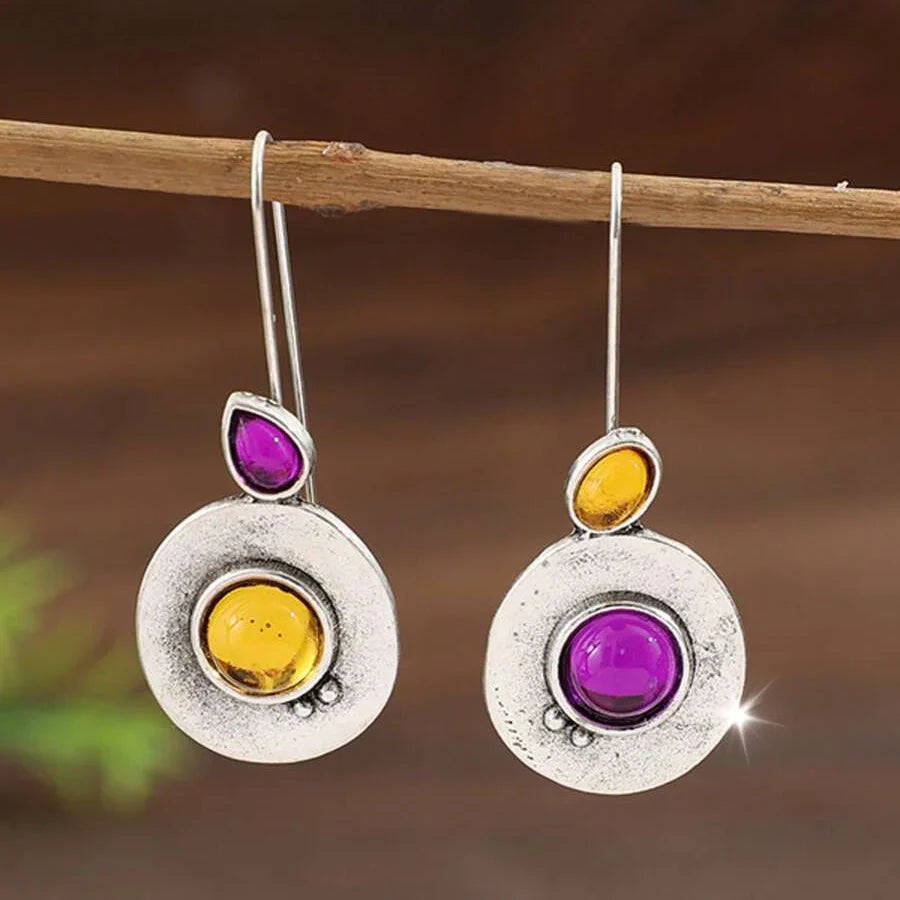 Pendientes vintage asimétricos con colgante de cristal morado redondo