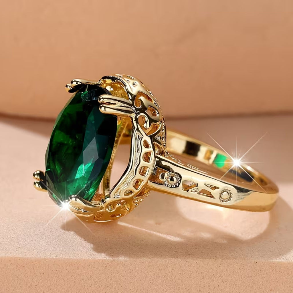 Oval statement-ring i vintagestil med smaragd-look