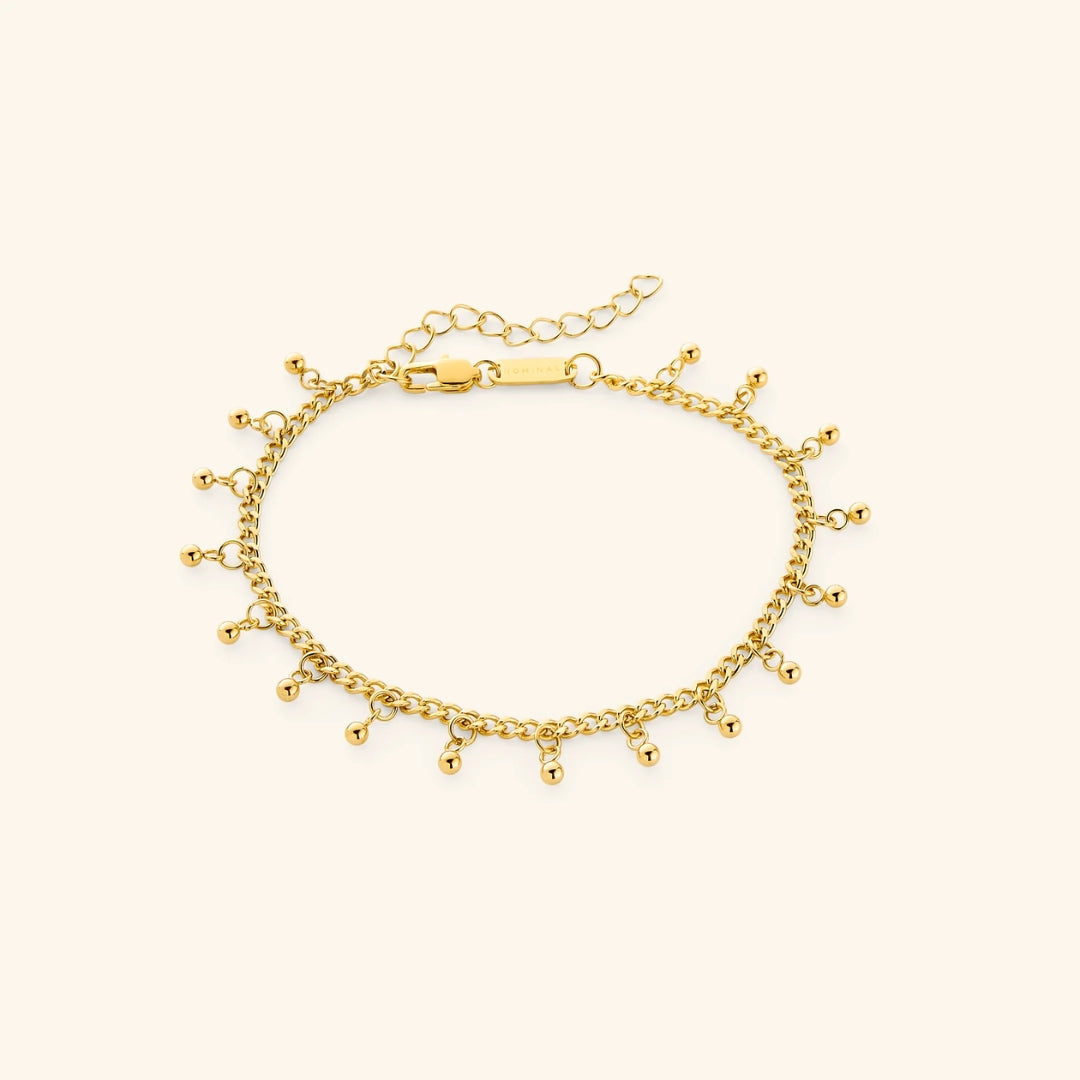 Dunne goudkleurige kralenarmband