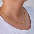 Dunne goudkleurige kralenketting
