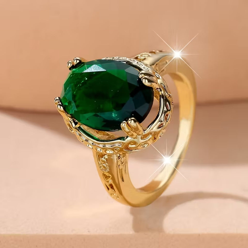 Oval statement-ring i vintagestil med smaragd-look