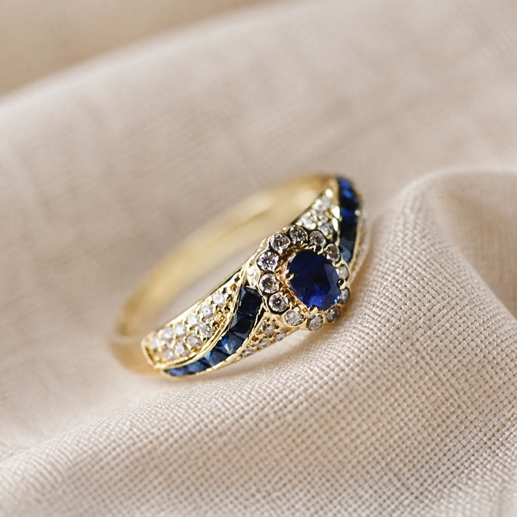 Gold-Tone Wave Ring with Blue Marquise Stones