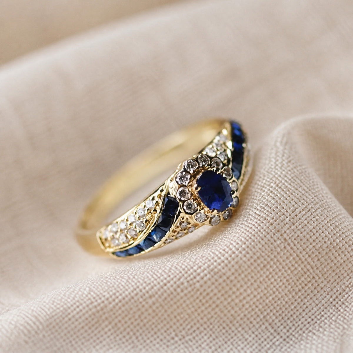 Gold-Tone Wave Ring with Blue Marquise Stones