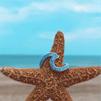Ring met zeegolf in opaallook en zilverkleur