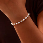 Pearl and Gold-Tone Chain Bracelet with Charm