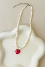 Ketting met harthanger aan kralenschakel met parellook
