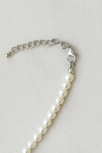 Ketting met harthanger aan kralenschakel met parellook