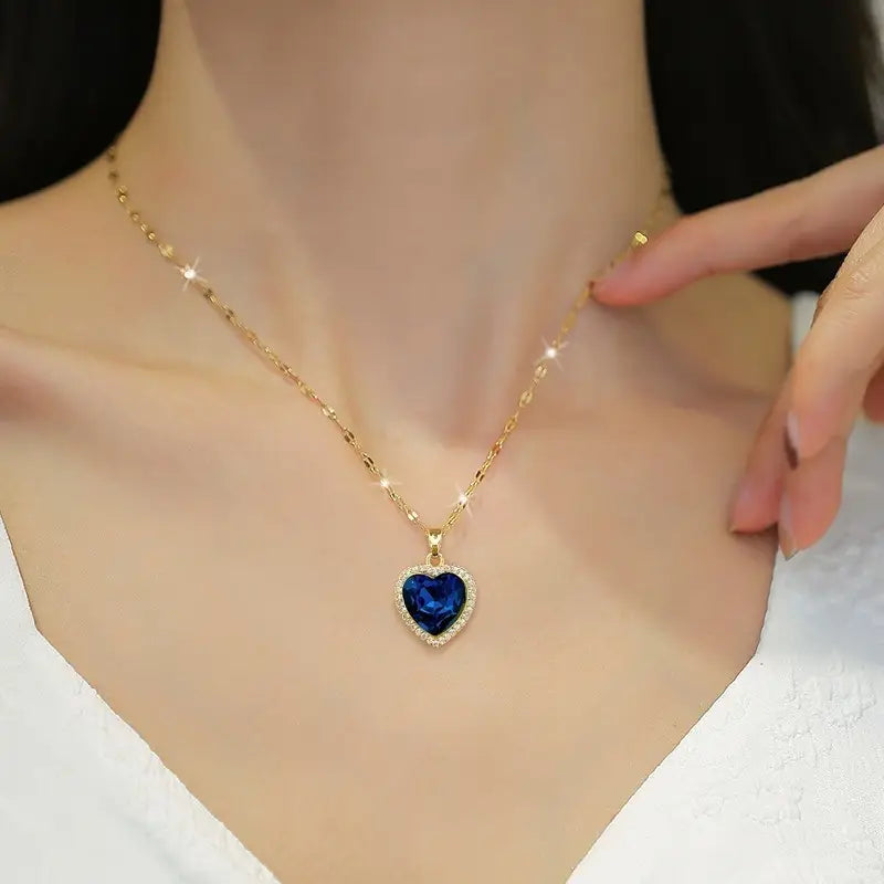 Blue Heart Stone Pendant Necklace in Gold Tone