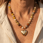 Handgemaakte bohemian ketting met hart van stenen kralen