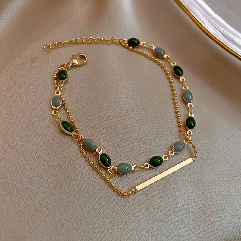 Gold-Tone Chain Bracelet with Green Square Stones