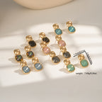 Goudkleurige oorknopjes met vierkante turquoise steen