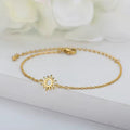 Thin Gold-Tone Chain Bracelet with Small Charm