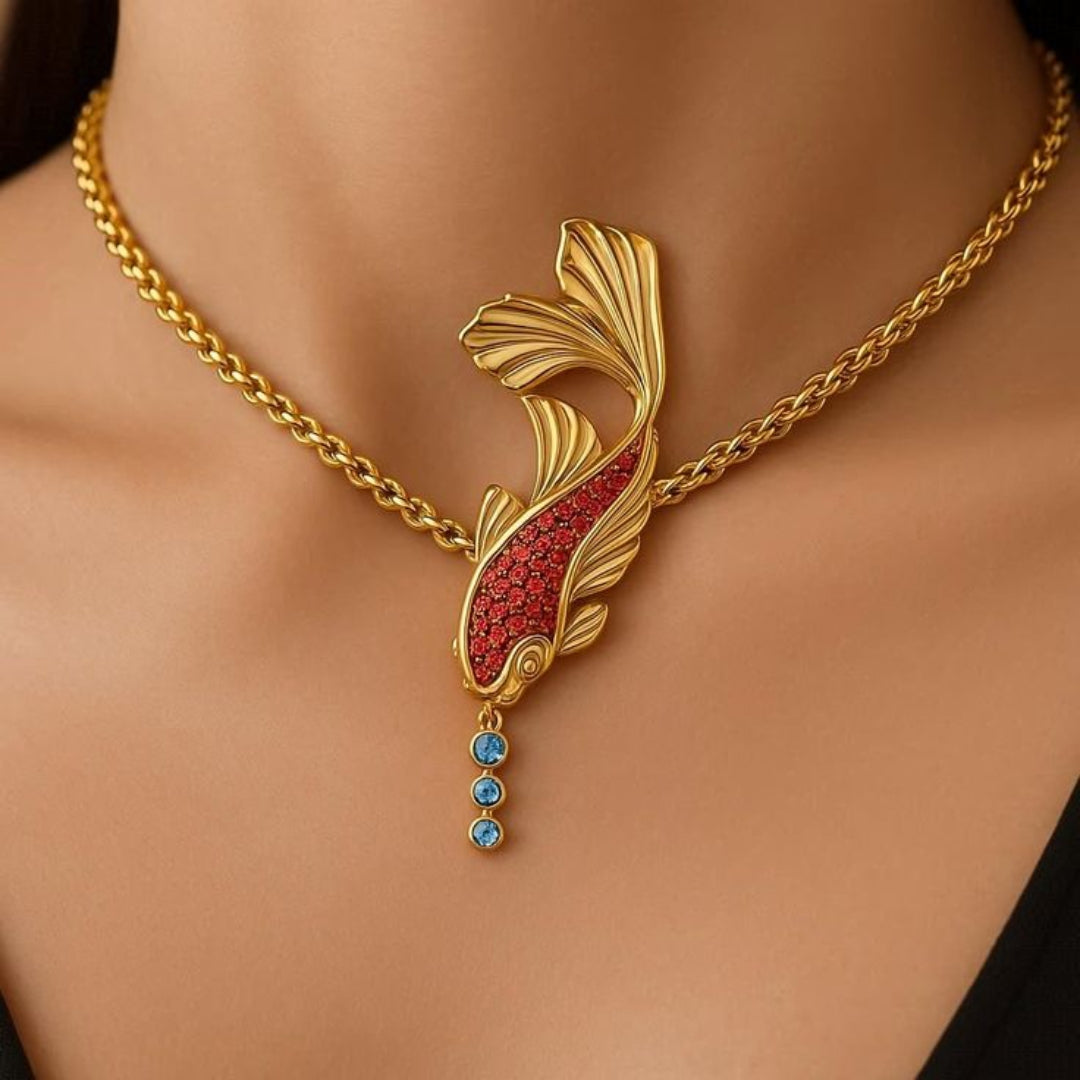 Goudkleurige ketting met koi-hanger