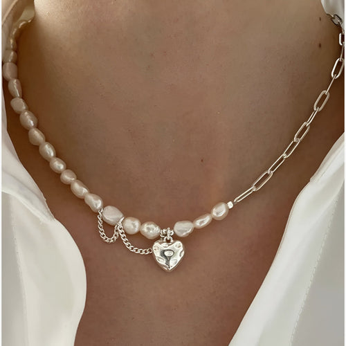Asymmetric Pearl Necklace with Heart Detail