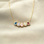 Druppelketting met geboortestenen van het gezin