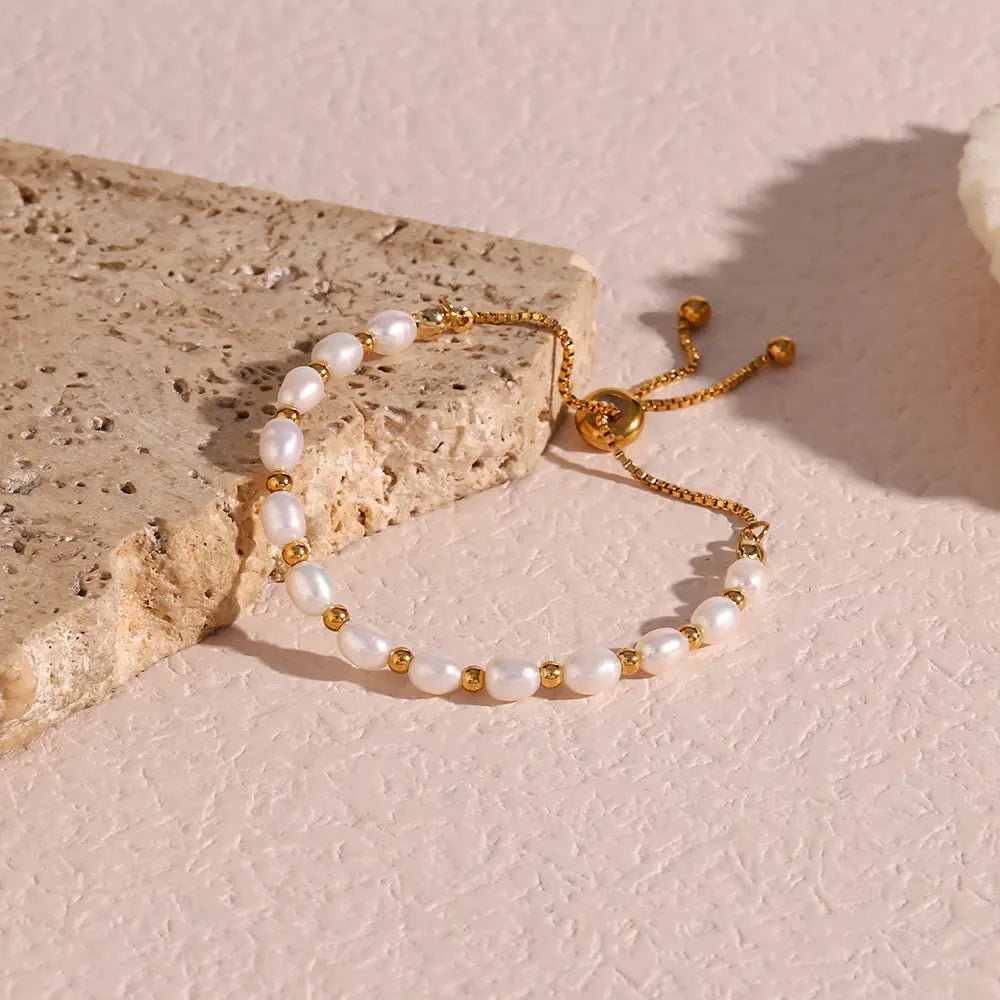 Pearl and Gold-Tone Chain Bracelet with Charm