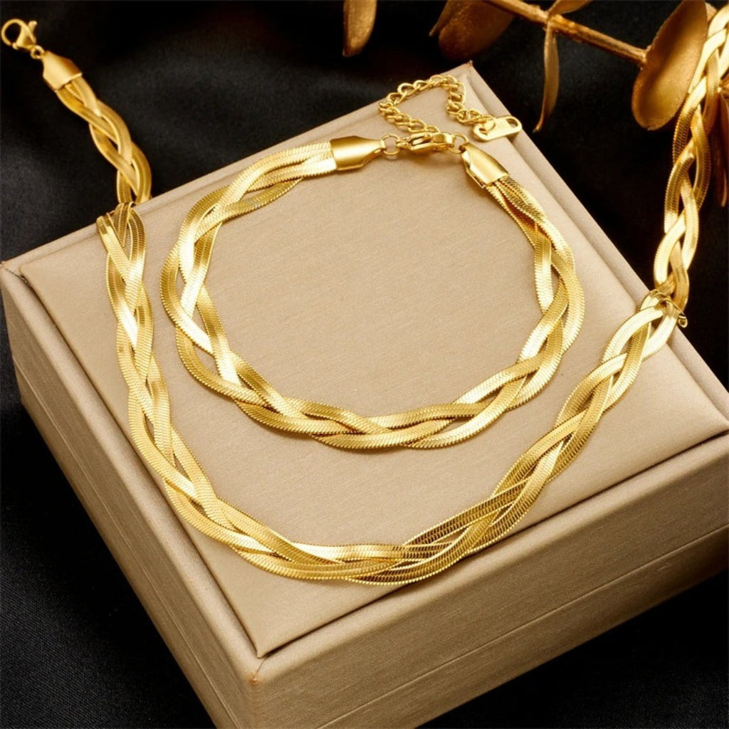 Set met slangenketting en armband in goudkleurig staal