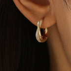 Twisted Gold-Tone Hoop Earrings with Pavé Crystal Accents