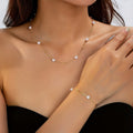 Fijne sieradenset met parelketting