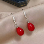 Ovale oorbellen met druppelhanger